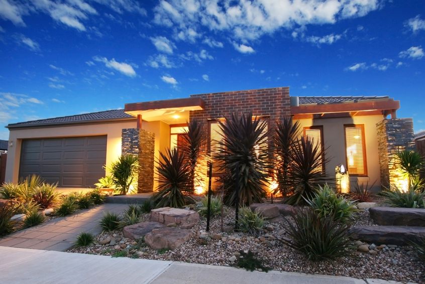 front yard desert style landscaping with rocks