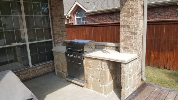 backyard bbq in stone patio