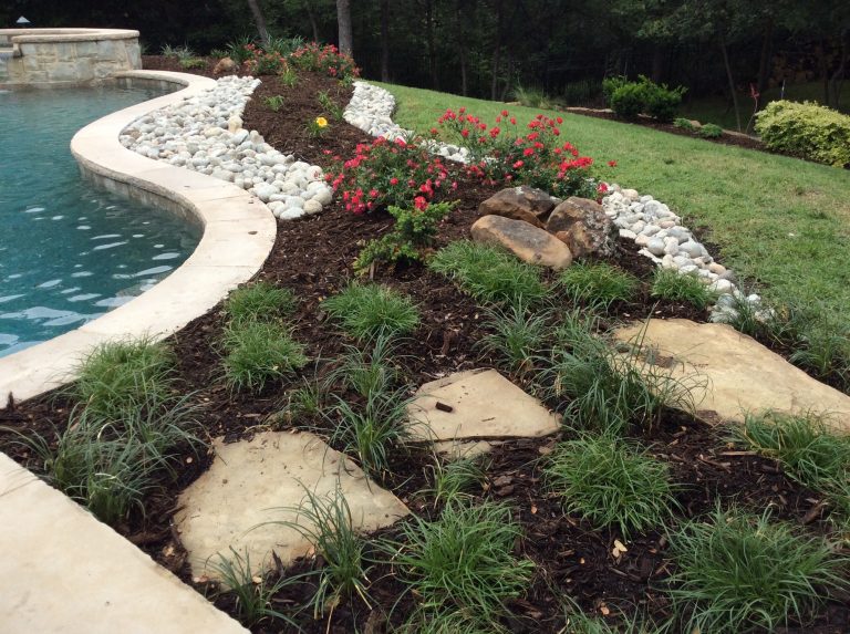 river rock landscaping around pool rocks and stones