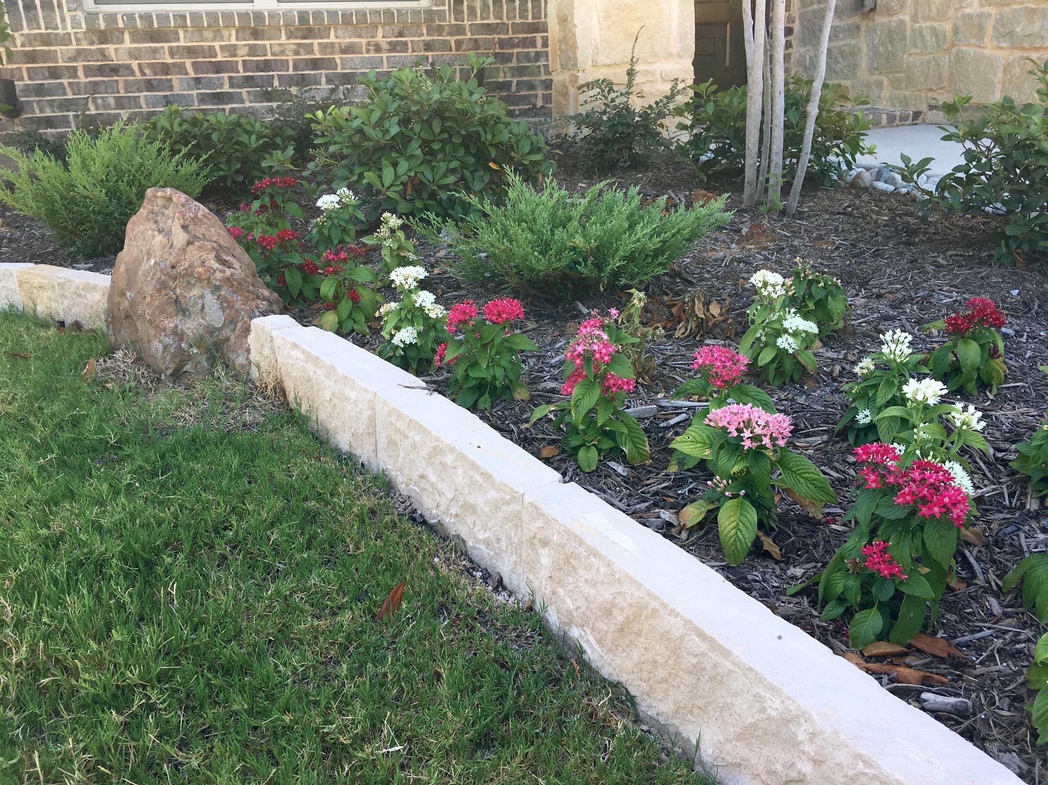 flower garden stone rock border new mulch