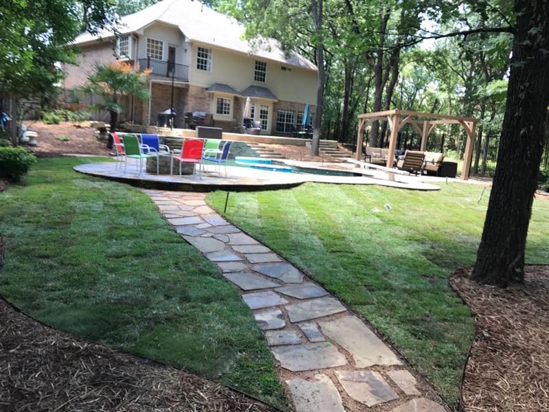 landscaping stone walkway backyard