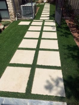 pavers in synthetic grass