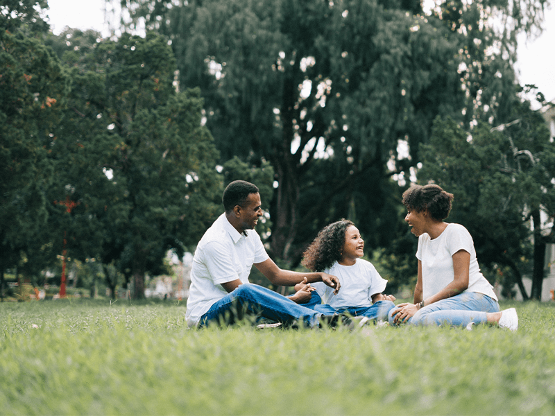 family on lawn fertilization