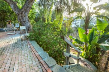 sloped yard with terrace and steps