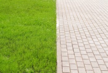 Can I put pavers over grass?