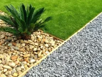 bg-front-yard-rock-landscaping-green-grass-768x514-1.webp